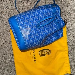 Goyard bucket in sky blue, purchased from Bergdorf’s in New York 💙